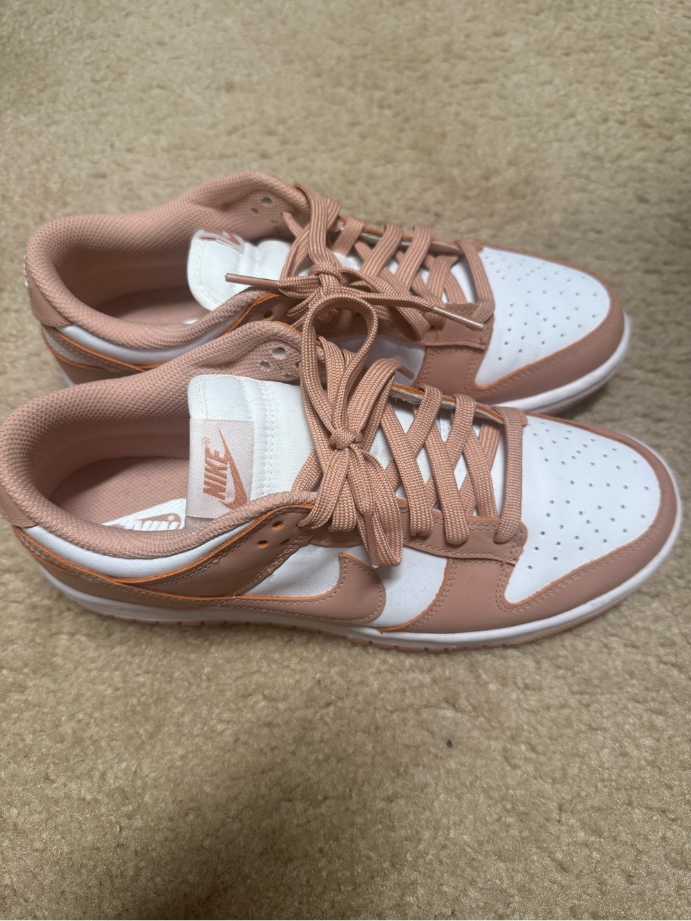 Nike Women’s Dunk Low Sneakers in White/Rose Whisper